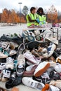 Teen Volunteers Sort Through Sneakers At Recycling Event