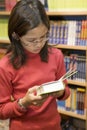 Teen wants to buy books Royalty Free Stock Photo