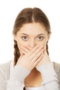 Teen woman covering her mouth. Royalty Free Stock Photo