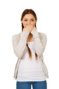 Teen woman covering her mouth. Royalty Free Stock Photo