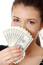 Teen woman with dollars. Royalty Free Stock Photo