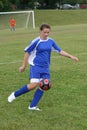 Teen Youth Soccer Action on Field Royalty Free Stock Photo