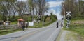 Teenage Amish Boys and Girls Walking Along a Rural Road