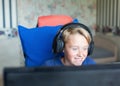 Teenage boy playing computer games on PC Royalty Free Stock Photo