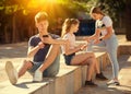 Teenage boy absorbed in online chat on mobile phone