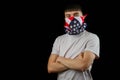 Teenage boy American Flag mask black background Royalty Free Stock Photo