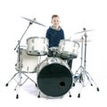 Teenage boy behind drum kit in studio Royalty Free Stock Photo