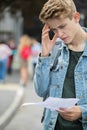 Teenage Boy Disappointed With Exam Results Royalty Free Stock Photo