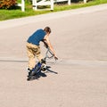 Teenage boy doing tricks on a BMX bike. Royalty Free Stock Photo