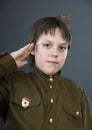 Teenage boy dressed in soviet uniform Royalty Free Stock Photo