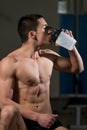 Teenage Boy Drinking A Water Bottle Royalty Free Stock Photo