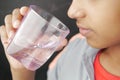 teenage boy drinking water close up Royalty Free Stock Photo