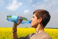 Teenage Boy Drinking Water