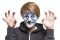 Teenage boy with face painting wolf Royalty Free Stock Photo