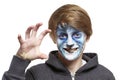 Teenage boy with face painting wolf Royalty Free Stock Photo