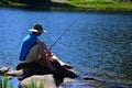 Teenage Boy Fishing on a Lake Royalty Free Stock Photo