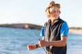 Teenage boy fishing at sea Royalty Free Stock Photo