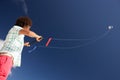 Teenage boy flying a kite Royalty Free Stock Photo