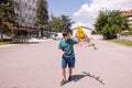 teenage Boy flying kite on a sunny day Royalty Free Stock Photo