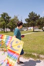 Teenage Boy flying kite on a sunny day Royalty Free Stock Photo