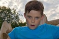 Angry teenager boy with freckles Royalty Free Stock Photo