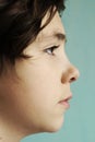 Teenage boy half face close up portrait Royalty Free Stock Photo