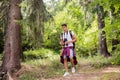 Teenage boy hiking in forest. Summer vacation. Royalty Free Stock Photo