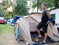 Teenage boy inflating mattress