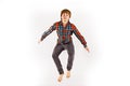 Teenage Boy Jumping In The Air Royalty Free Stock Photo