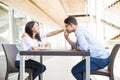 Teenage Boy Kissing Girlfriend`s Hand At Shopping Center