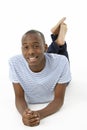 Teenage Boy Laying On Stomach Royalty Free Stock Photo