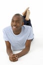 Teenage Boy Laying On Stomach Royalty Free Stock Photo