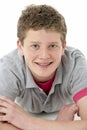 Teenage Boy Laying on Stomach Royalty Free Stock Photo