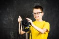 Teenage boy using big digital camera Royalty Free Stock Photo