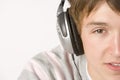 Teenage Boy Listening To Music On Headphones Royalty Free Stock Photo