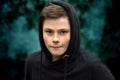 Teenage boy in black hoodie Royalty Free Stock Photo