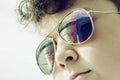 Teenage boy with mirroring bridge in sunglasses Royalty Free Stock Photo