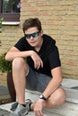 Teenage boy with modern sunglasses Royalty Free Stock Photo