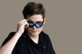 Teenage boy with modern sunglasses Royalty Free Stock Photo