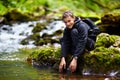 Teenage boy near a river Royalty Free Stock Photo