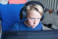 Teenage boy playing computer games on PC Royalty Free Stock Photo