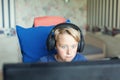 Teenage boy playing computer games on PC Royalty Free Stock Photo