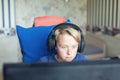 Teenage boy playing computer games on PC Royalty Free Stock Photo