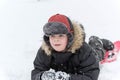 Teenage boy playing snow in winter Royalty Free Stock Photo