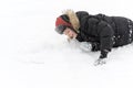 Teenage boy playing snow in winter Royalty Free Stock Photo