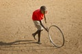 Teenage Boy Playing with Wheel - Landscape Royalty Free Stock Photo