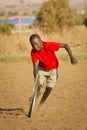 Teenage Boy Playing with Wheel - More Action Royalty Free Stock Photo