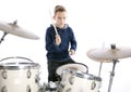 Teenage boy plays drums in studio Royalty Free Stock Photo