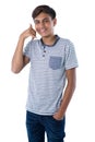 Teenage boy pretending to talk on a cell phone Royalty Free Stock Photo