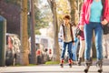 Teenage boy rollerblading at autumn city Royalty Free Stock Photo